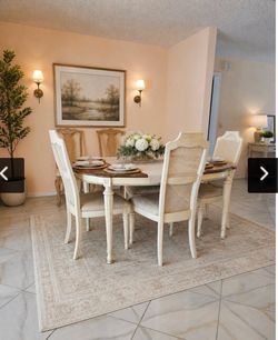 Dining Room Table with 4 Chairs has two leaves to expand