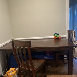 Wooden Table + 4 matching chairs 