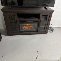 TV Stand Fireplace With Heat,and Remote $125 Buffet Cabinet $75 Console Table $50 Lane Reclining Chair $150