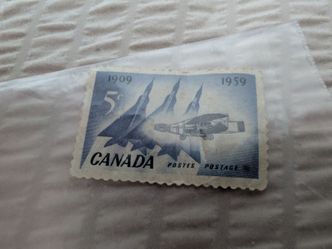 1909 and 1959 5¢ Canadian Stamp