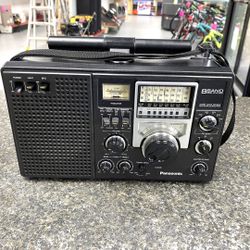 Panasonic RF-2200 Shortwave Double Superheterodyne FM / AM / SW 8 Band Portable Radio with Strap & Power Cord  (FM/AMC Switches Have a  TPW011333