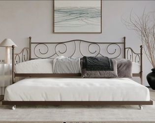 Black metal Pottery Barn trundle bed
