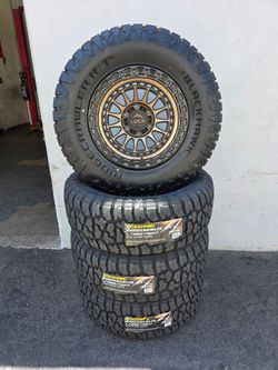 17" LOCK Mojave bronze/cooper black lip w/ 33" RT tires