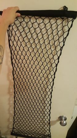 Trunk net holder