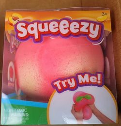 squeezy peach , fidget toy