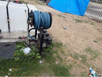 Pressure washer and hundred gallon tank