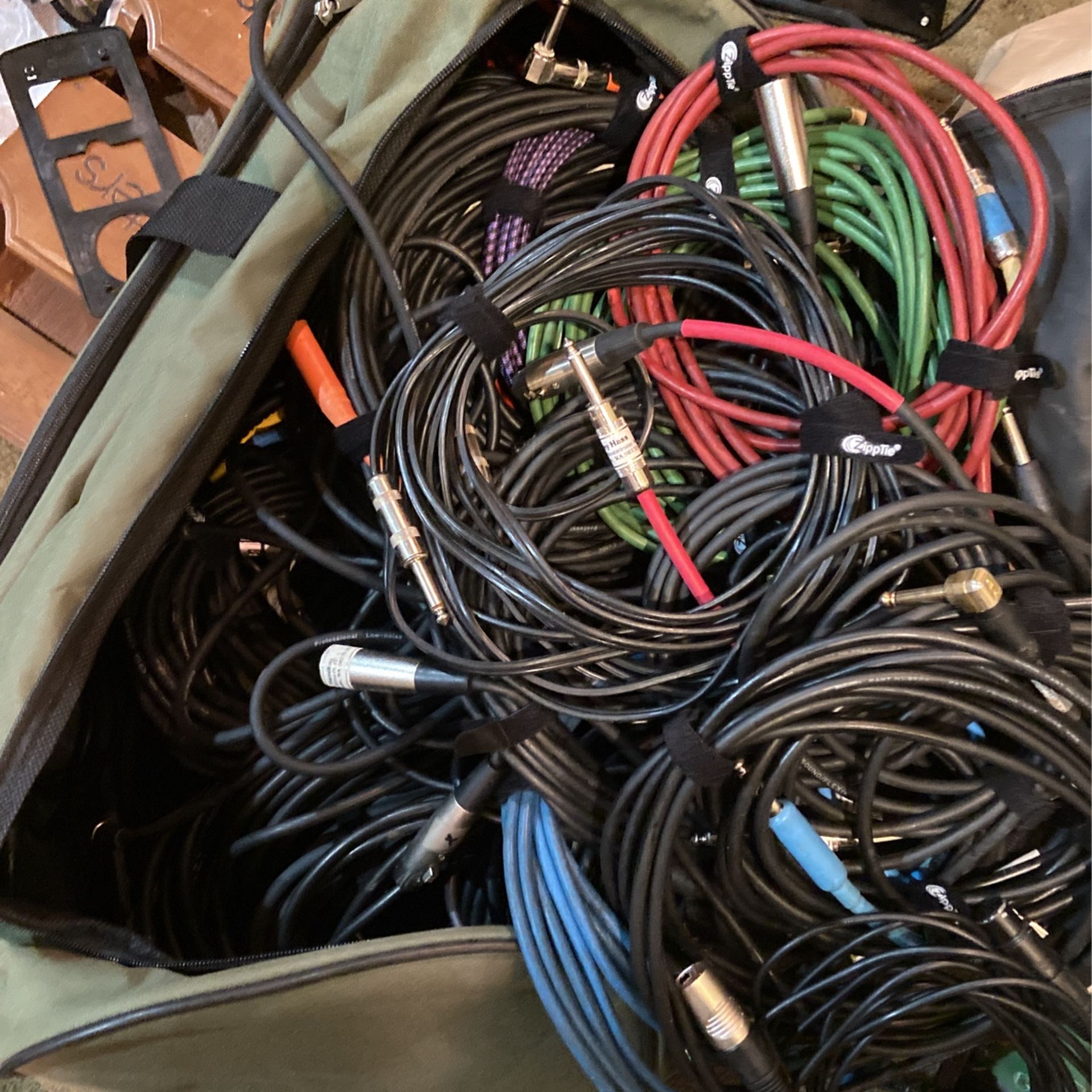 An abundance of 1/4 , XLR cords lots of lengths sizes