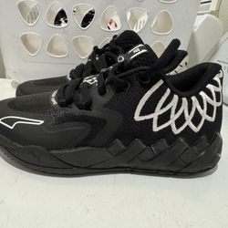 2 Pairs Of Puma Melo MB.01 youth Size 4.5 and 5