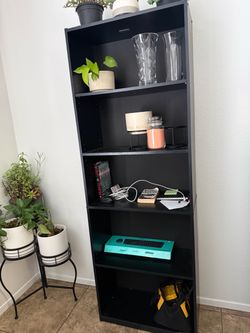 2 dark bookshelves