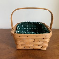 Longaberger basket w/ Green Insert - about 7.25” L x 8.25” W x 3.75” T, 7.5” T w/handle