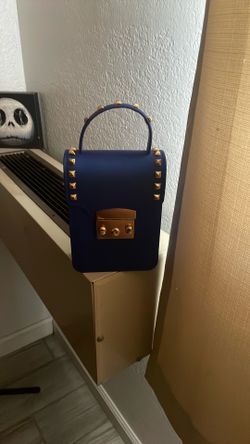 Blue phone and small stuff bag