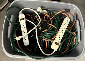 Several extension cords and outlets