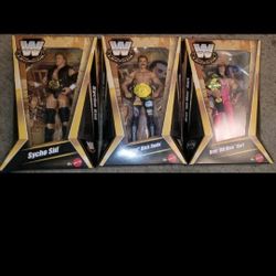 WWE ELITE COLLECTION LEGENDS SERIES 25 RAVISHING RICK RUDE, Bret Hart, & Sycho S