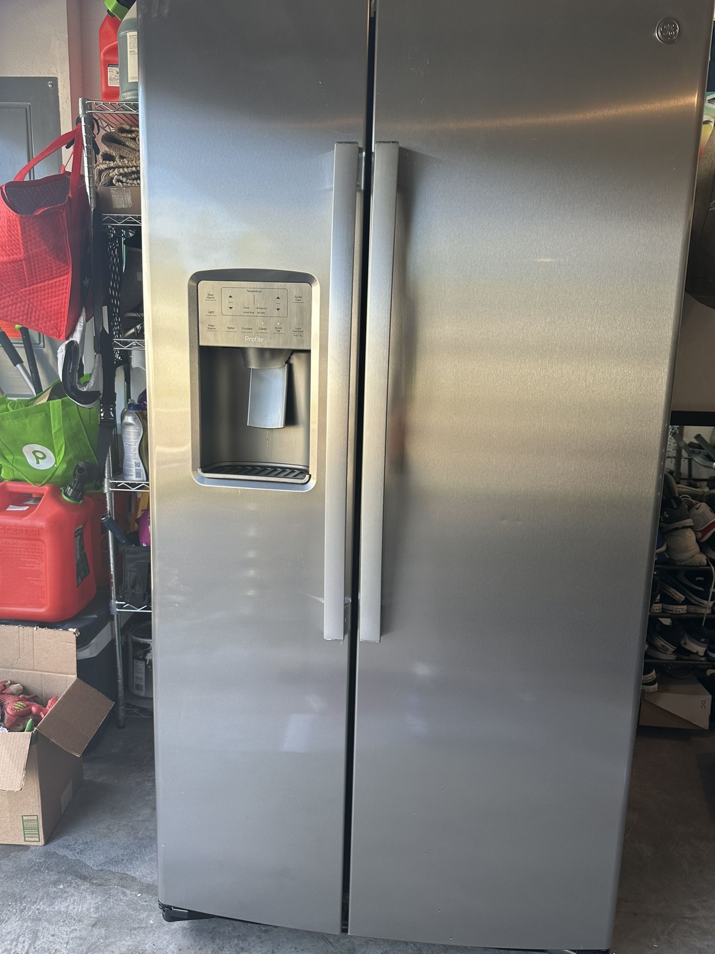 GE profile side-by-side refrigerator with icemaker