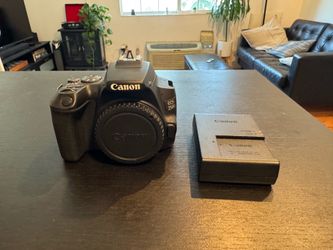 Canon EOS 250D/Rebel SL3 DSLR Camera Body w/ battery, charger, and plug-in battery