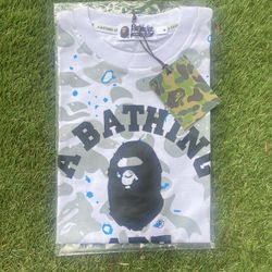 White and Baby blue bape shirt Size medium🌀