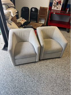 Grey swivel Barrel Chairs