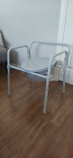 2 N 1 NEW NEVER USED SHOWER CHAIR AND BEDSIDE TOILET