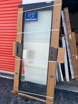 PGT 37 1/2x 79 3/4 IMPACT ENTRY DOOR BRONZE FRAME