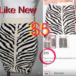 $5 like new Bebe Pencil Skirt size XS in mint condition stretching Fabric