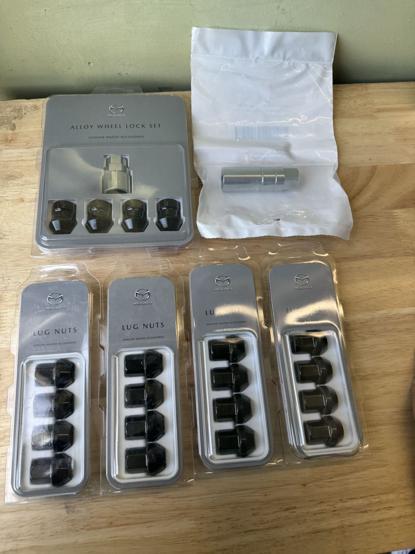 OME Black Mazda Wheel Lugs And Lock