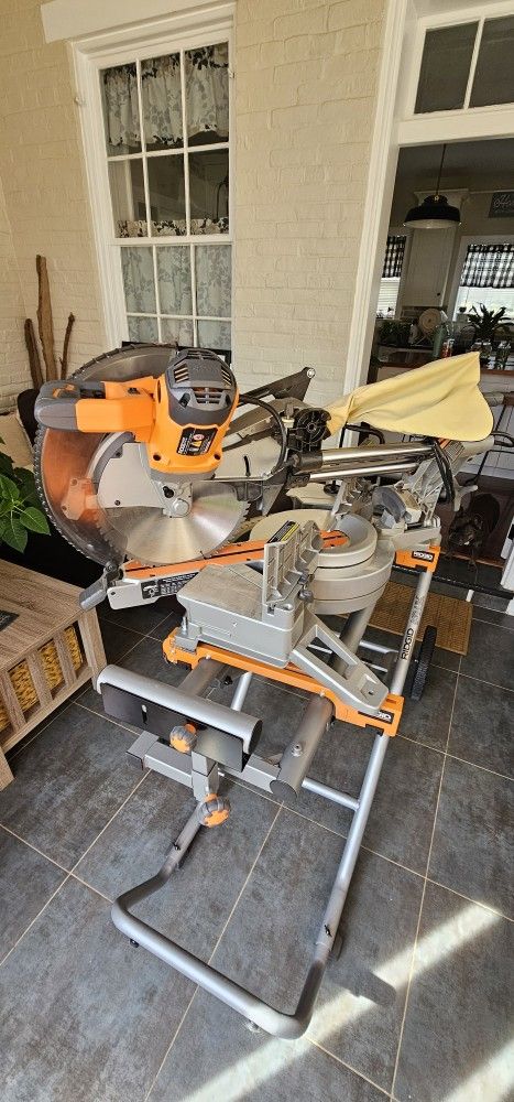 Rigid 15 Amp Corded 12 in. Dual Bevel Sliding Miter Saw With 70 Degree Miter Capacity. With Stand.