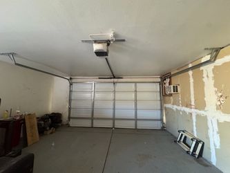 Beige 2 Car Garage Door With Motor