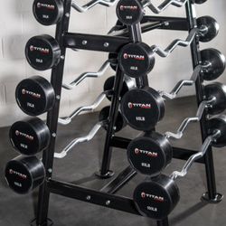 Six (6) Titan Fitness Fixed Barbells And Storage Rack