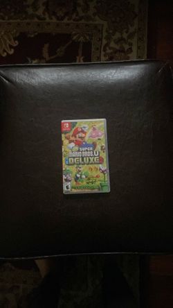 Nintendo Switch – New Super Mario Bros. U Deluxe (Complete with Case)