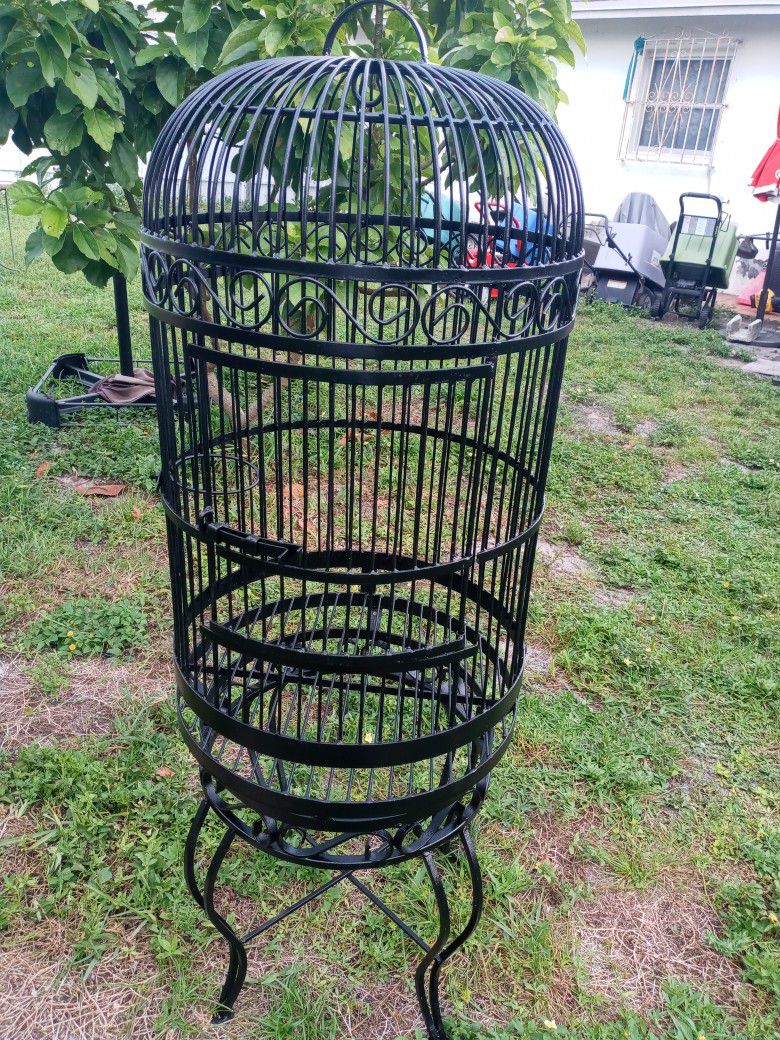 Iron Bird Cage. 18x48".