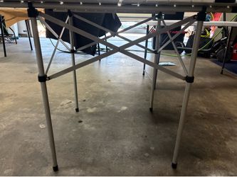 Folding metal camp table