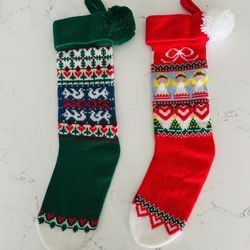 set of two Vintage hallmark 1982 & 83 Christmas knit stockings with Pom poms  19” long. great condition. made in Taiwan  They look like new  
