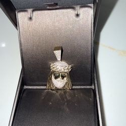 Christ pendant with diamonds.