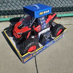 New Bright RZR Pro Battery Remote Control Red Polaris ATV