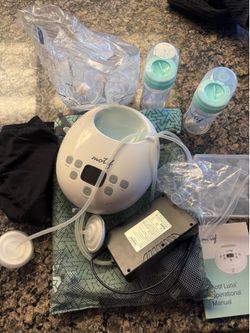 Motif breast pump