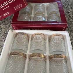 2 Sets of decorative glasses with gold trim