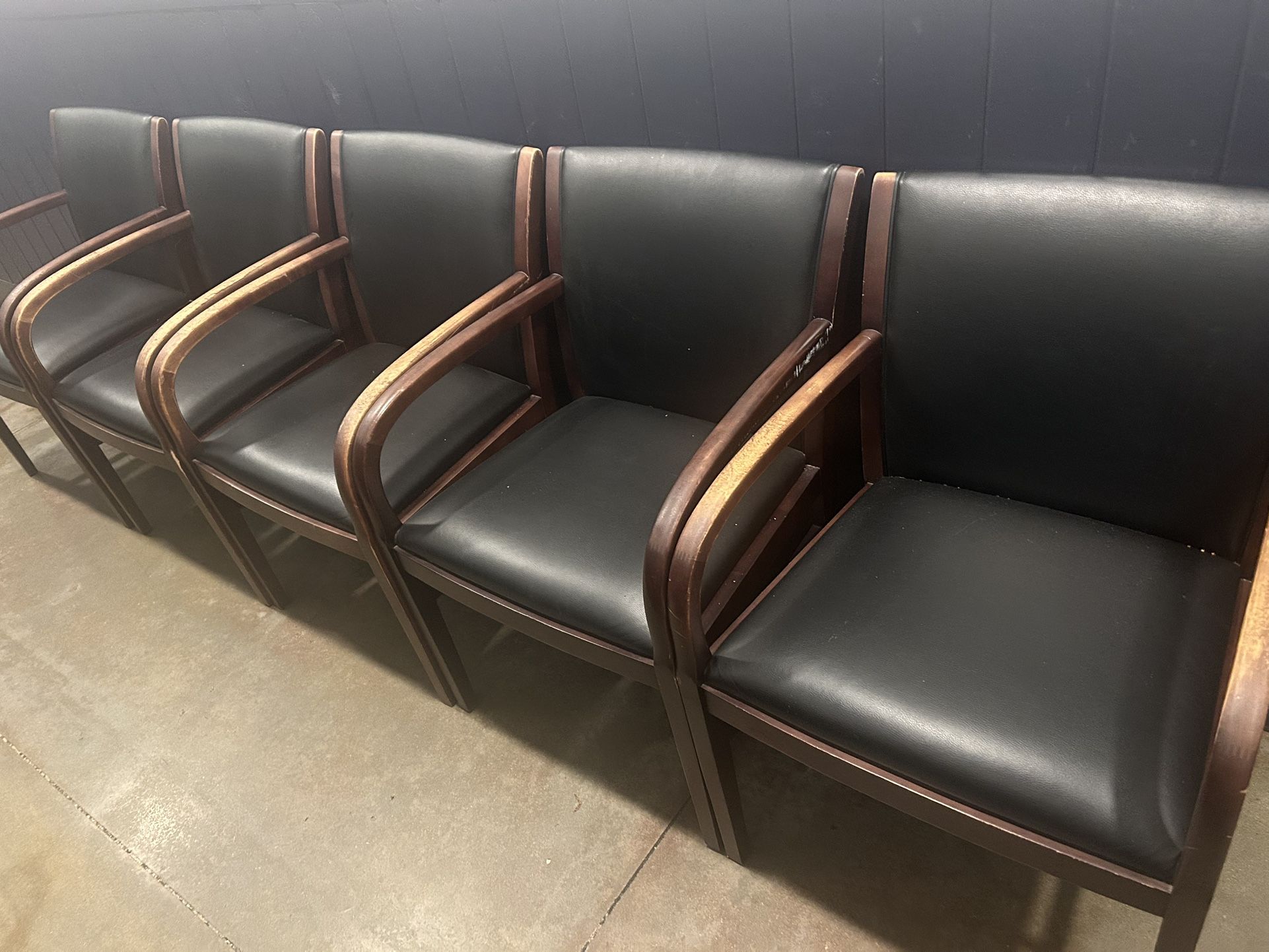 Up For Sale Set of 5 Wood and Leather Chairs