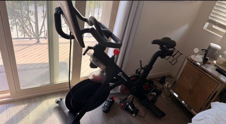 Peloton Exercise Bike with Screen + Two Pairs of Cycling Shoes