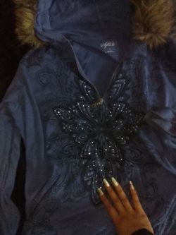 Oversized y2k long sleeve throw with fur and rindsrone design