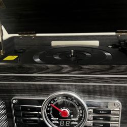 Vitrola LP, CD, cassette player and AM/FM radio. Bluetooth and aux. 