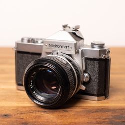 Nikon Nikkormat FT + Nikkor 50mm f1.4 vintage 35mm film camera SLR fast prime lens . canon Pentax Nikon Minolta Sony