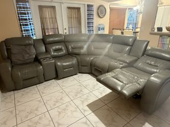 Real leather Sectional & matching ottoman