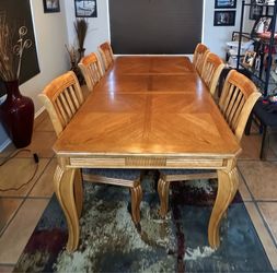 Dining table and six upholstered chairs