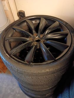 22" TESLA MODEL X RIMS AND TIRES.