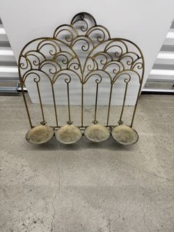 Wall hung candle holder