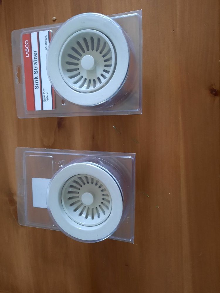 2 new almond sink strainers