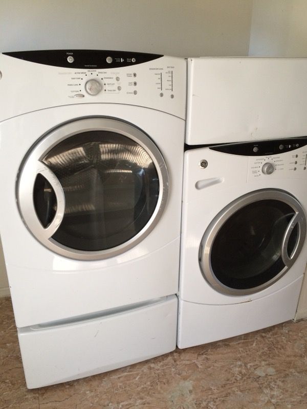 front load GE washer and dryer on pedistals