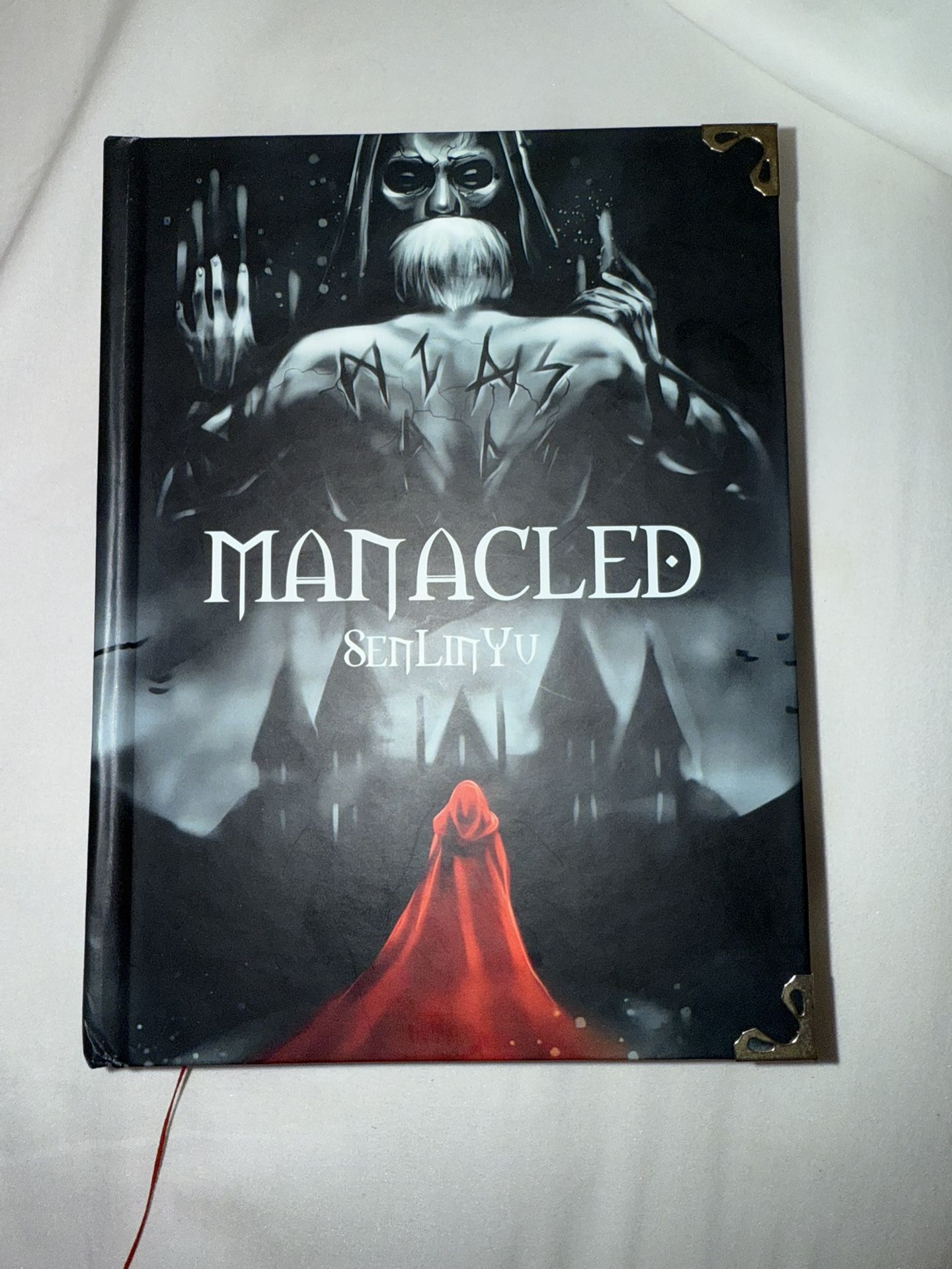 Manacled Book