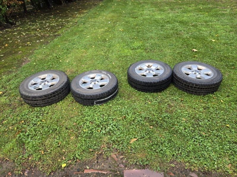 245/65R17 Cooper Discoverer M+S Studded Tires with 5x114.3 Ford Explorer Wheels (Set of 4)