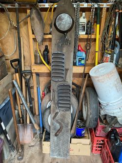 Antique cast iron items on wood